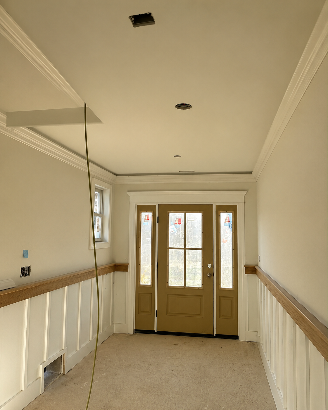 Foyer trim work before the completed entryway finish